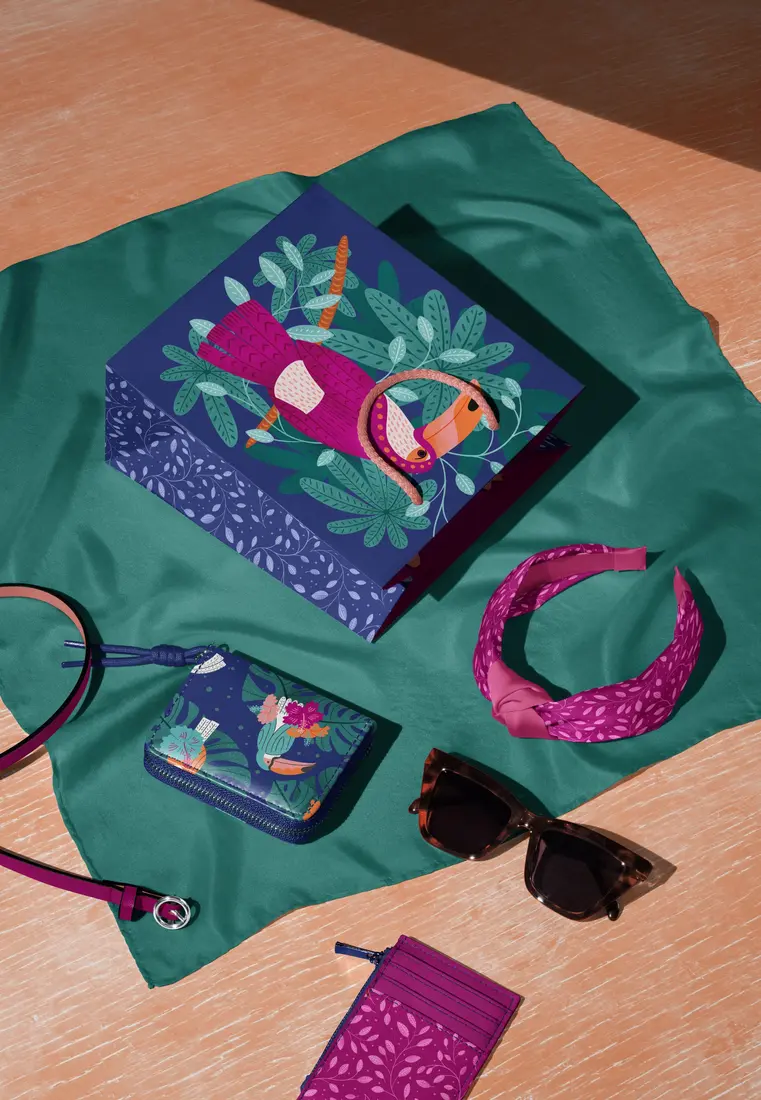 Tropical Treat accessories: leaf-print scarf, toucan gift bag, purse and floral headband